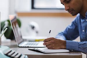 Man-completing-his-PhD-doctorate-Innovation-WP-pixabay-300px-compressed